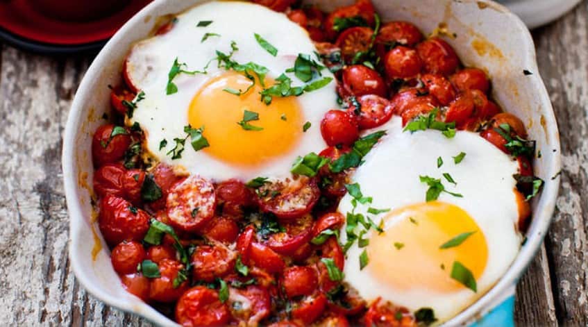 Baked eggs on a bed of roasted cherry tomatoes