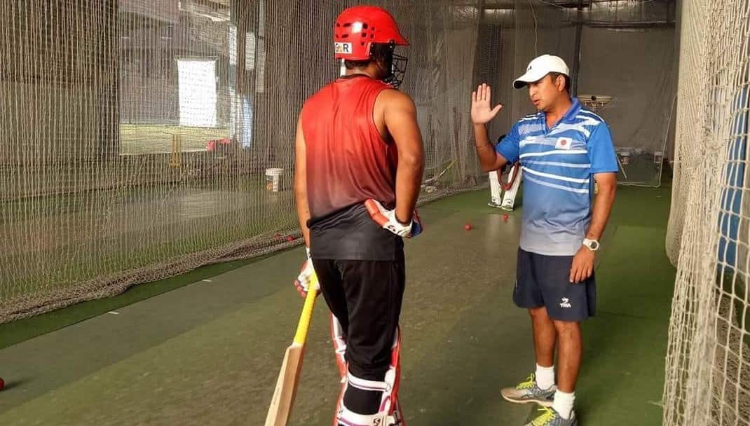 Bating consultant Apurva Desai seen giving tips to Nepal cricket team batsman
