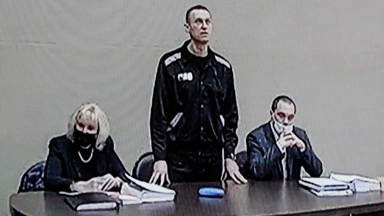 Russian opposition leader and activist Alexei Navalny (C) is seen on a monitor screen during an offsite court session in the penal colony N2 (IK-2) in Pokrov, Vladimir region, Russia, 15 February 2022. At an offsite court hearing in the penal colony N2 (I