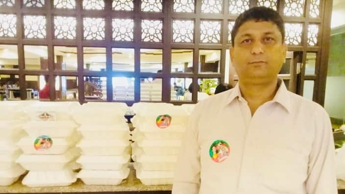 Yasir kiyani with his beef biryani boxes