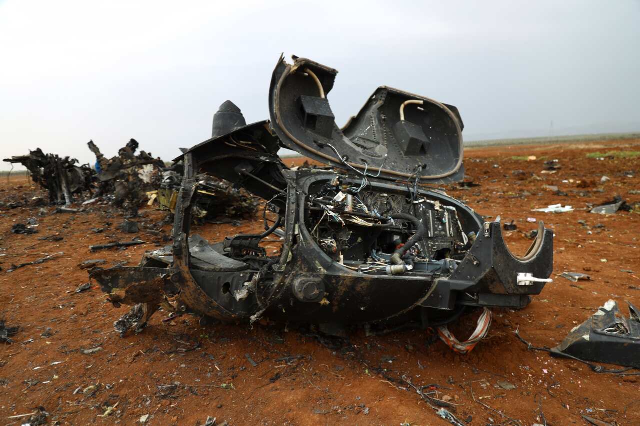 A wreckage of an American helicopter is seen in Afrin region , Syria