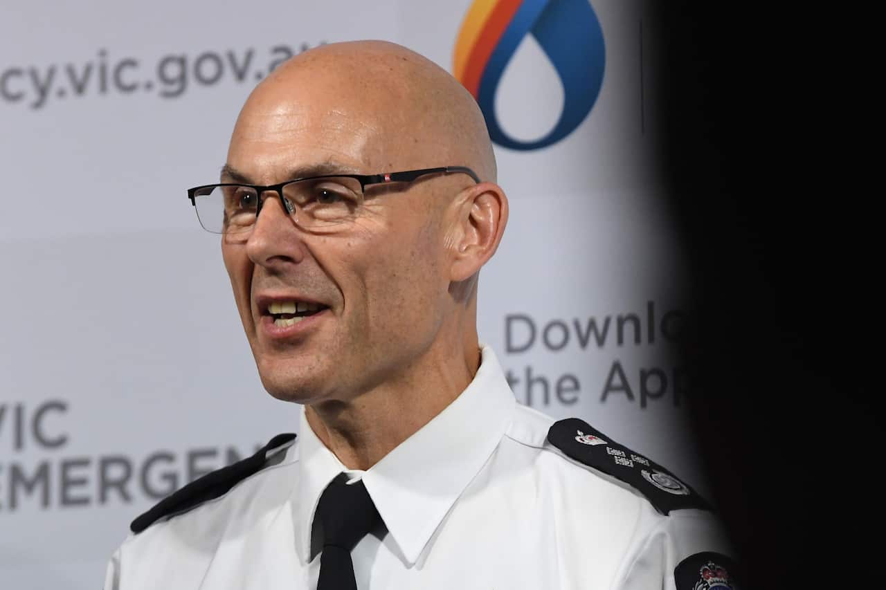 Victoria's Emergency Management Commissioner, Andrew Crisp, addresses the media.