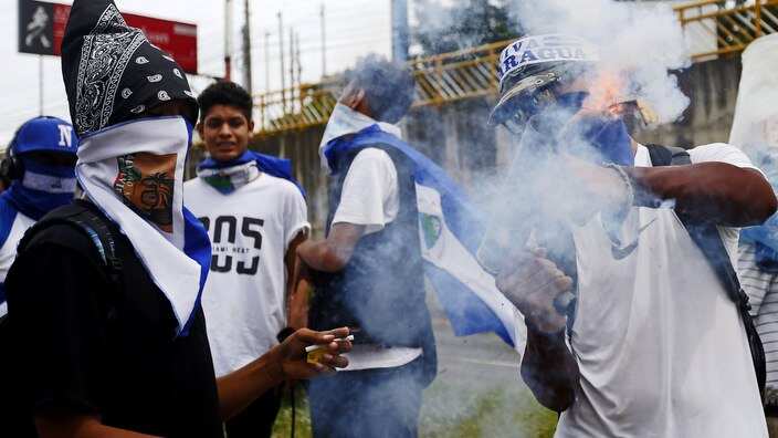 Protestors take part in a rally to mark 100 days of unrest, in Managua, Nicaragua.