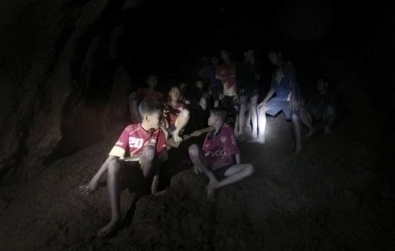 An undated handout photo released by Royal Thai Army on 03 July 2018 shows the missing 13 young members of a youth soccer team including their coach