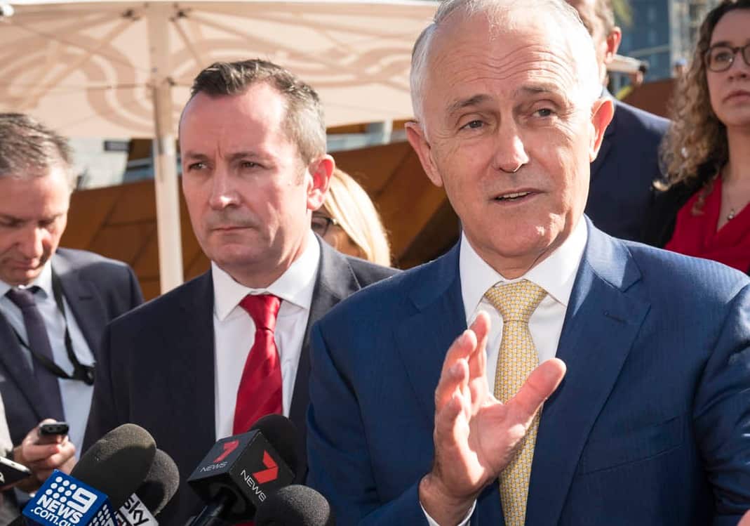 Prime Minister Malcolm Turnbull and Western Australian Premier Mark McGowan (left of Mr Turnbull) during a press conference in Perth, Friday, April 27, 2018. (AAP Image/Tony McDonough) NO ARCHIVING