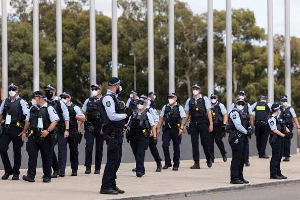 Policemen and women outside Parliament House in Canberra on Tuesday, 8 February, 2022.