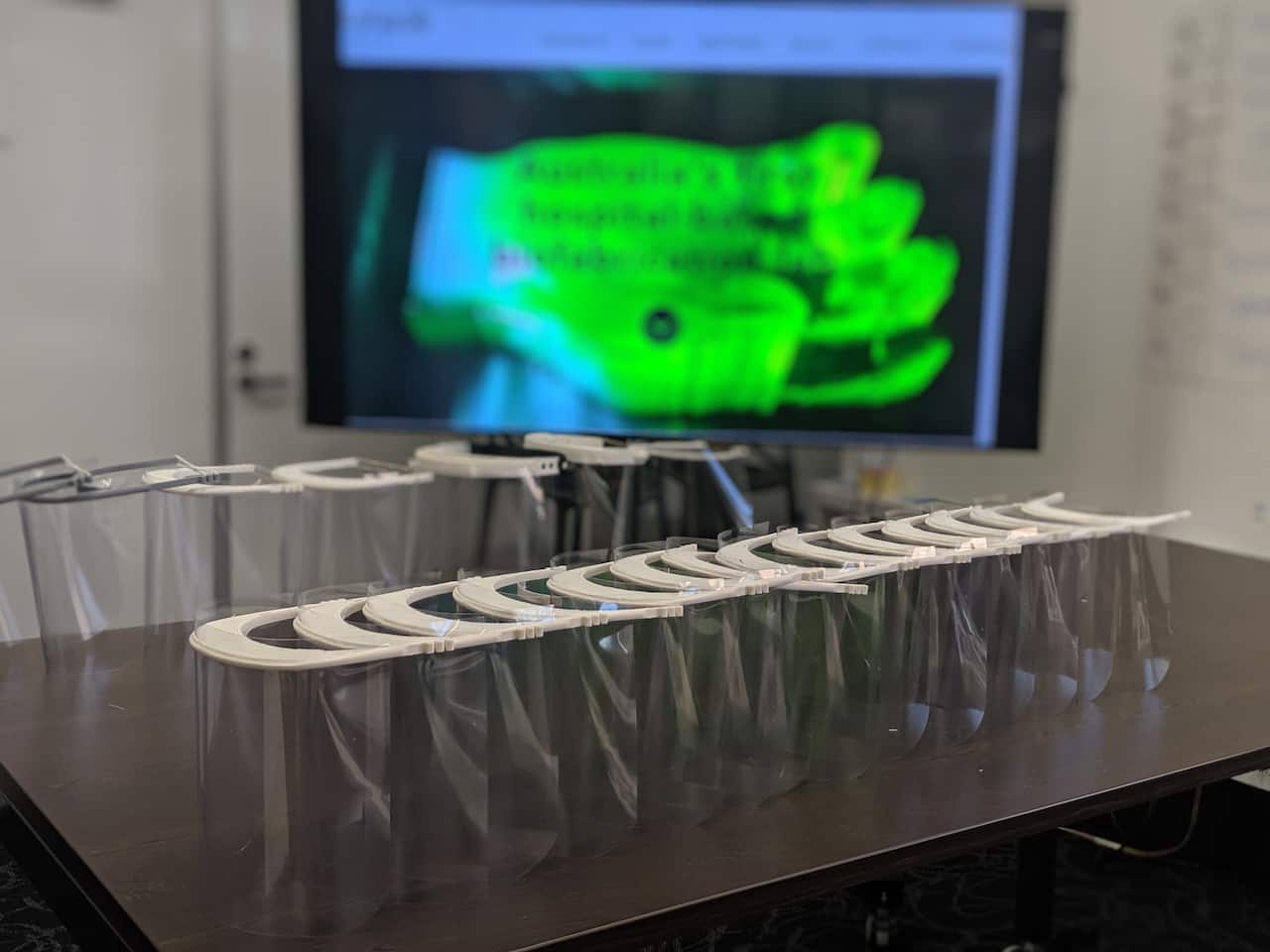 Facial shields produced by 3D printers at Melbourne lab, BioFab3D.