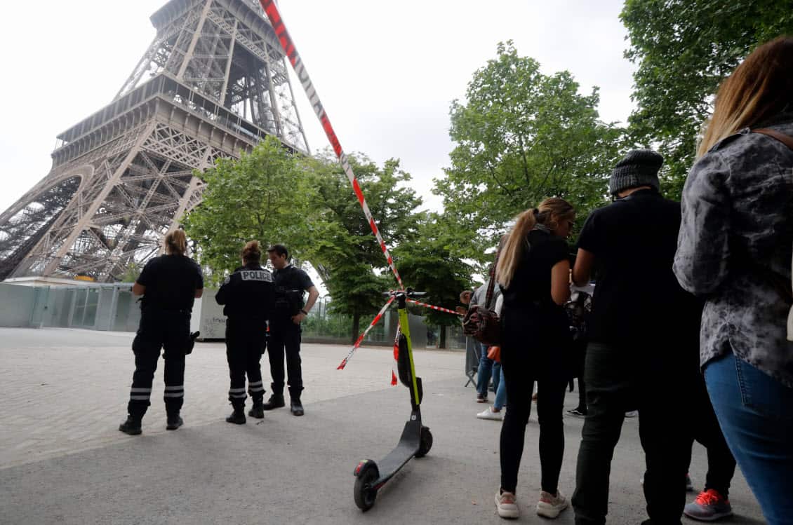 Police prevent tourists from entering the area of the Eiffel Tower Monday, May 20, 2019 in Paris (AAP)