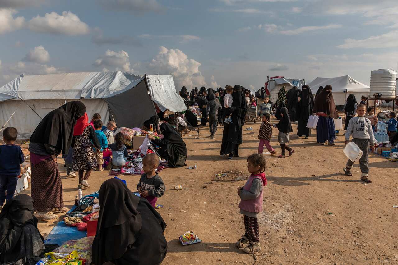 Women and children who had fled areas under Islamic State group control in the al-Hawl camp in northern Syria, March 28, 2019. (Ivor Prickett/The New York Times)