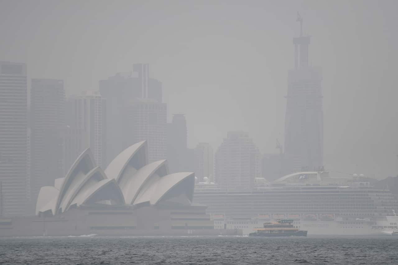 Heavy rain and clouds have replaced smoke over Sydney.
