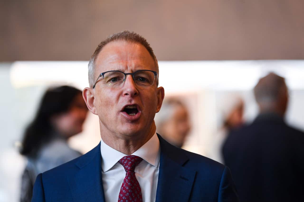 Arts Minister Paul Fletcher speaks to the media the National Gallery of Australia in Canberra.