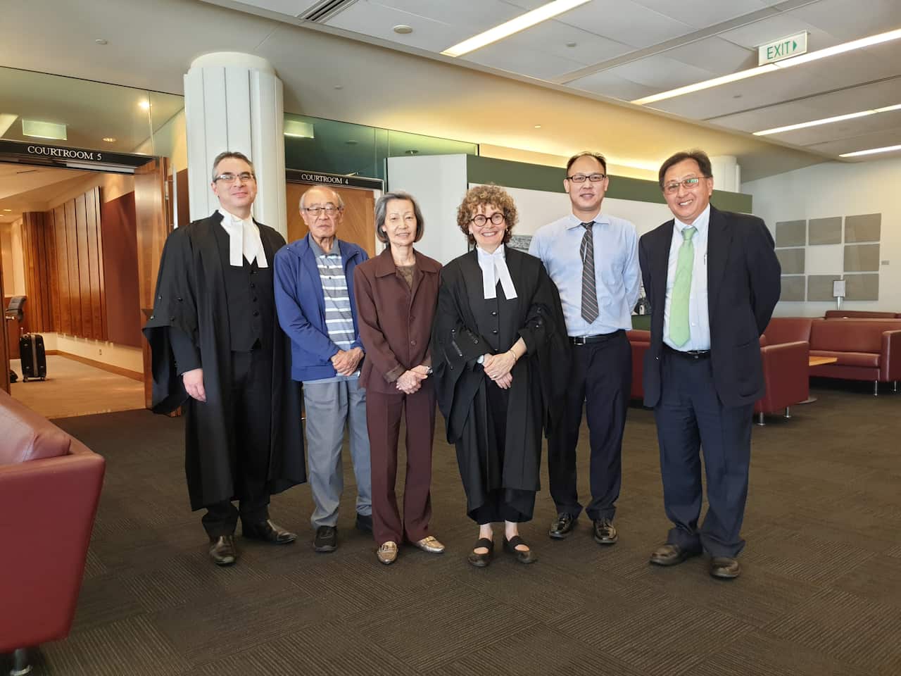 Troy Lee (2nd from right) at the federal court with (l to r) lawyer Matt Black, father Gordon Lee, mother Amy Lee, barrister Kim Rubenstein, and lawyer Michael Chan