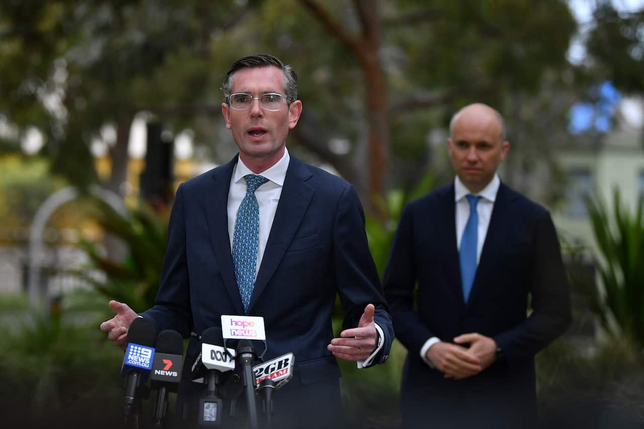 NSW Premier Dominic Perrottet (left) and NSW Treasurer Matt Kean speaks to the media during a press conference in Sydney, Tuesday, October 12, 2021.