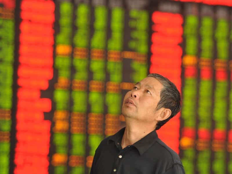 A concerned Chinese investor.A global credit rating agency says Australia is the "clear loser" from China's economic slowdown. (AAP)