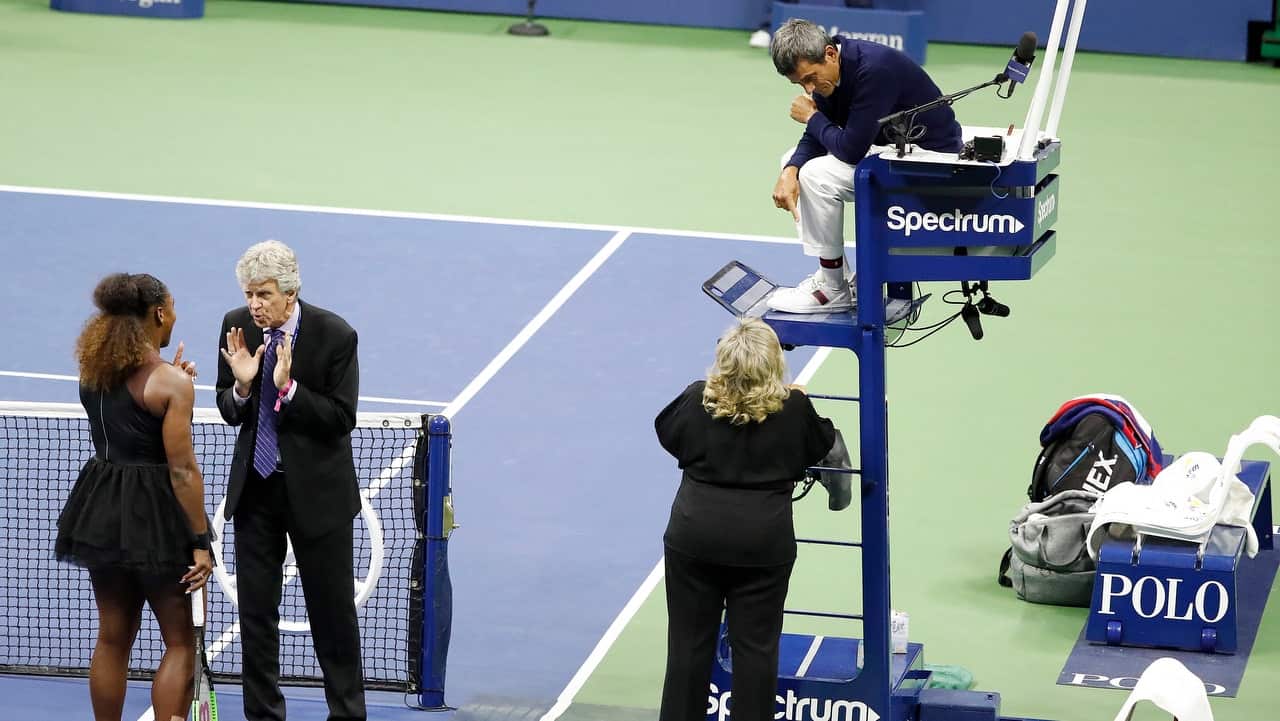 Serena Williams gestures towards tournament referee Brian Earley.