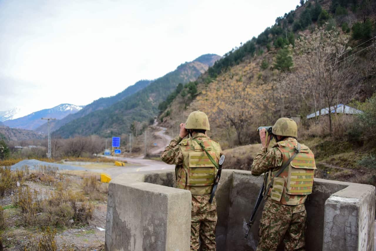Pakistani soldiers watching over potential Indian troop movements on Saturday at the Chakothi post, near the Pakistan-India border.