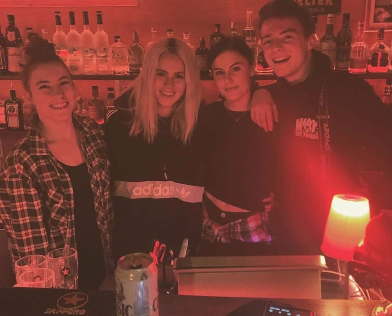 Racheal Wellman, pictured left, working in Niseko, Japan before the coronavirus cut her plans short.