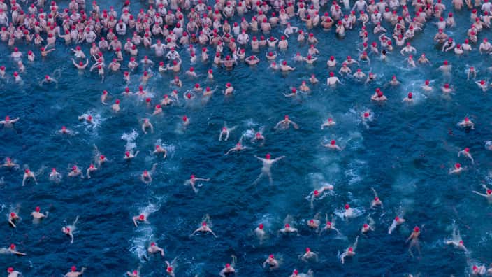 After the initial shock of the icy temperatures, swimmers started enjoying the swim.