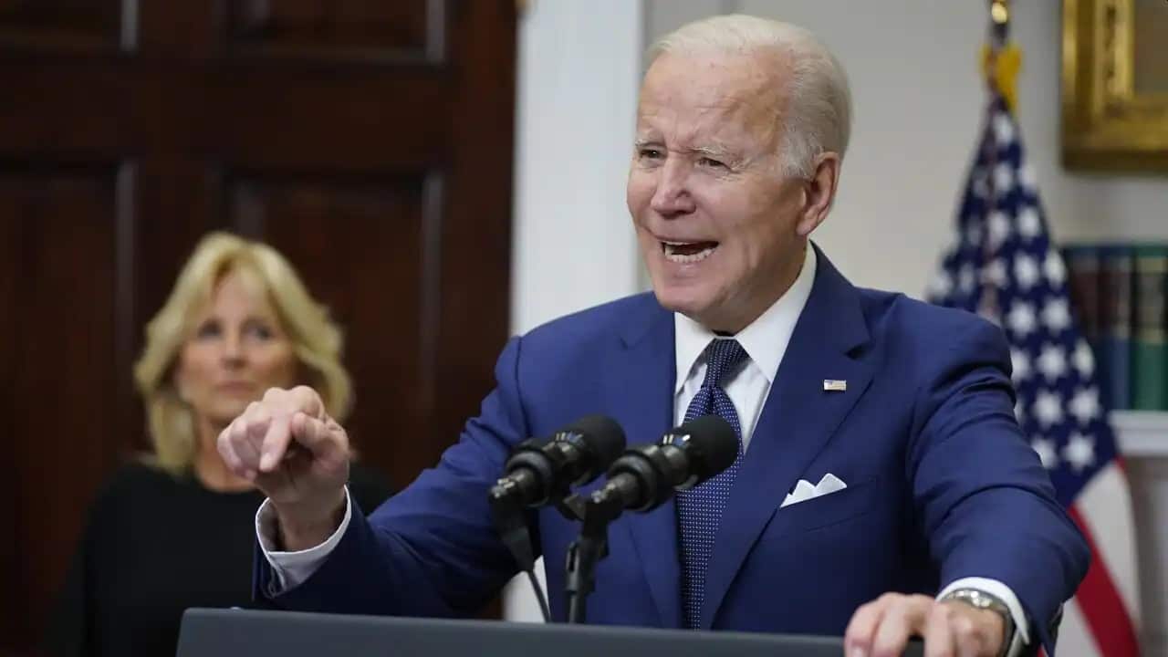 US President Joe Biden speaks to the nation about the mass shooting at Robb Elementary School in Uvalde, Texas, from the White House, in Washington, 24 May 2022, as first lady Jill Biden listens.