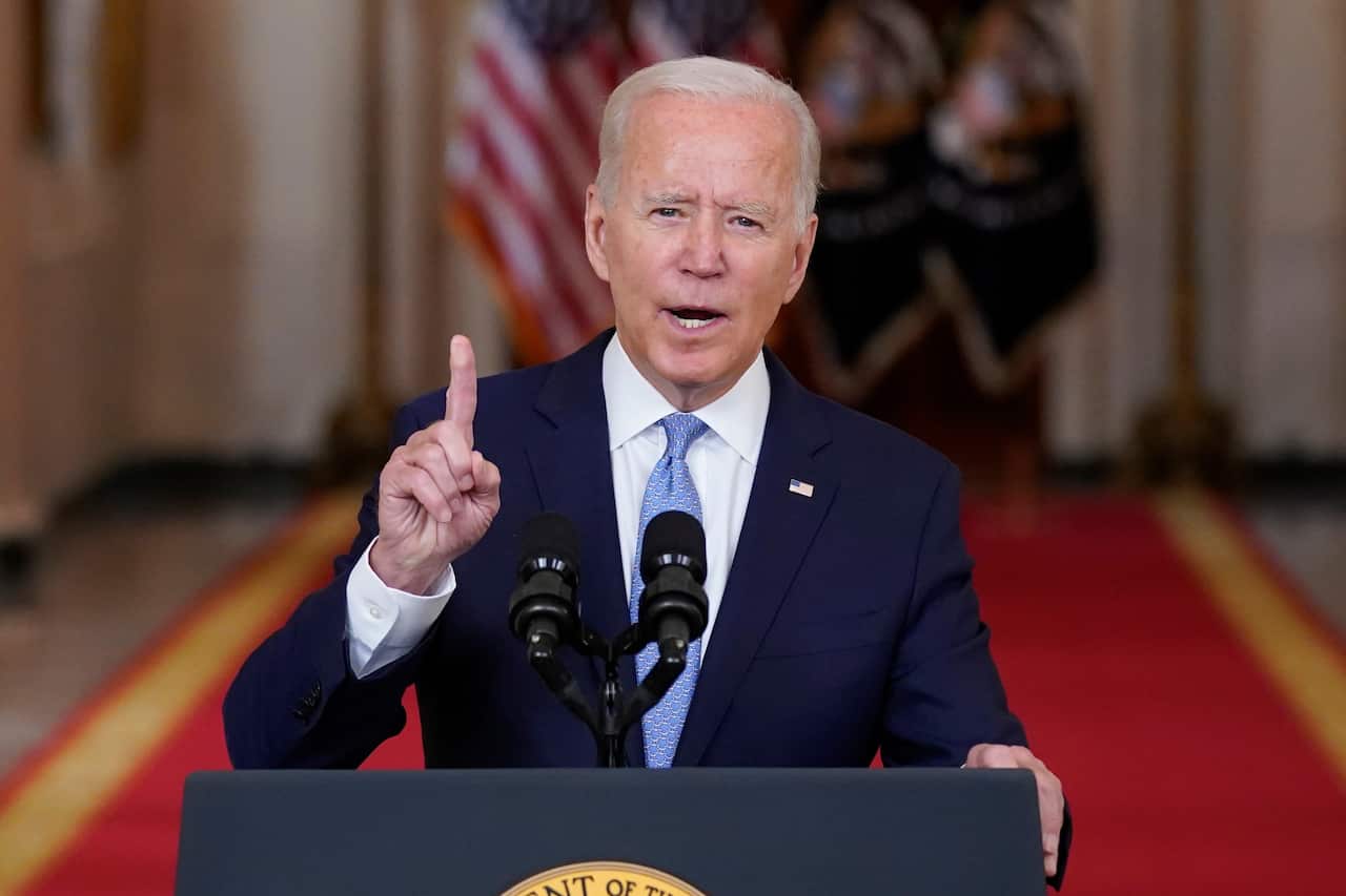 US President Joe Biden speaks from the State Dining Room of the White House