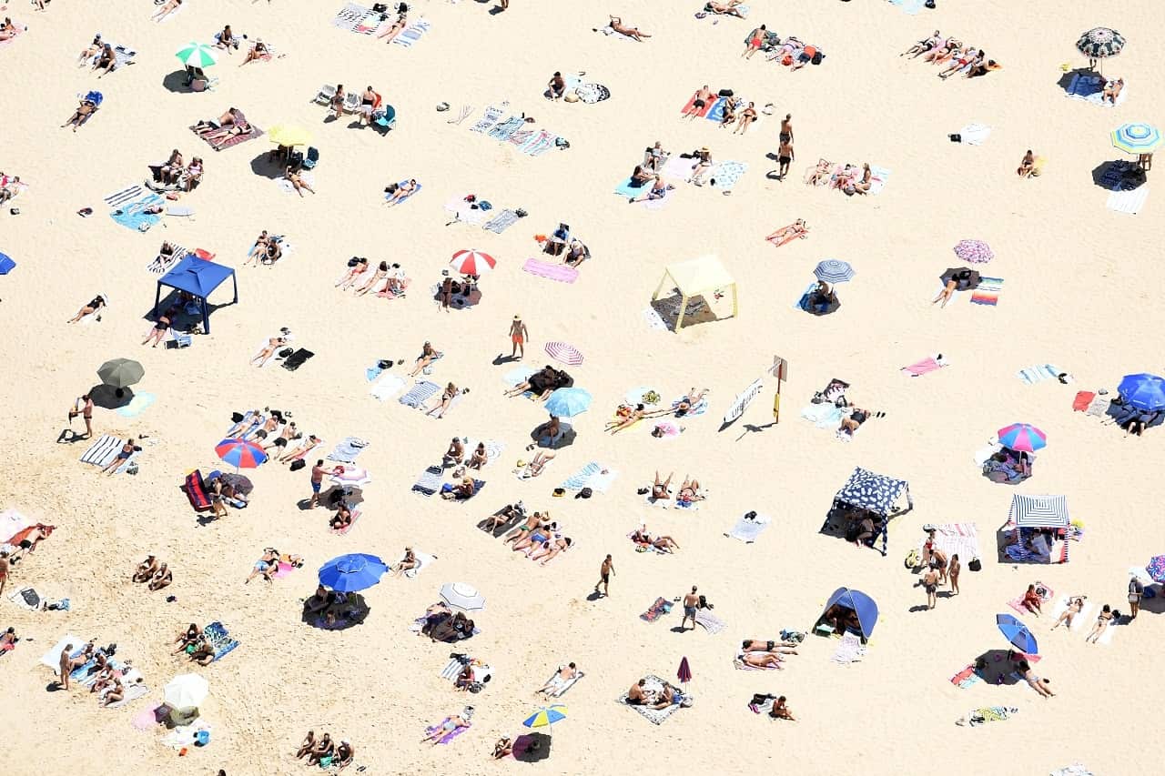 An aerial image of sunbathers at Coogee Beach.