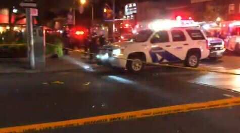 Police at the scene following the shooting.