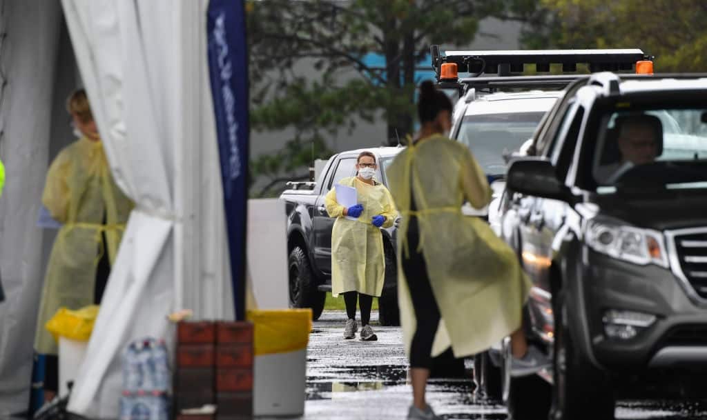 Cars lined up at a COVID-19 drive through testing clinic at the Cavanbah Centre on 30 March, 2021 in Byron Bay. 