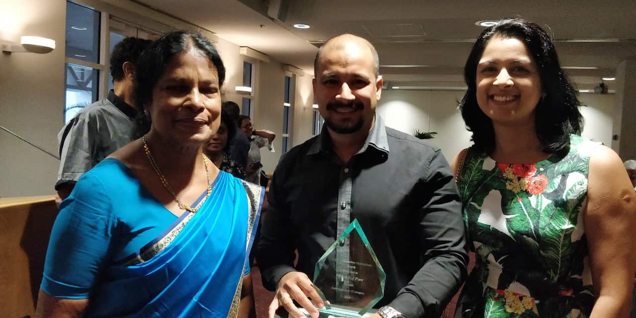 Nitesh Raj Pant (center) after receiving the Yogan Sathianathan Multicultural Award 2018 at NT's Parliament House.