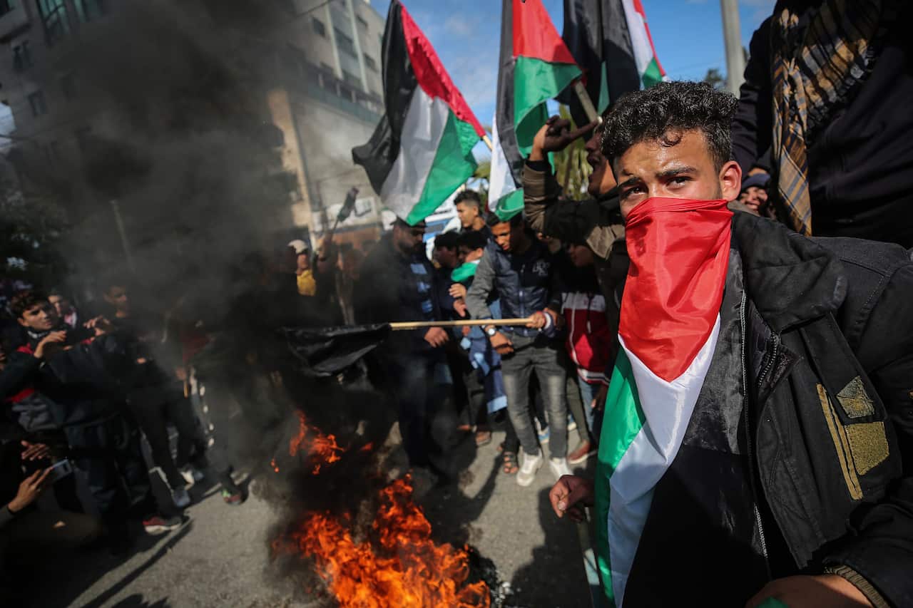 epa08172849 Palestinians chant slogans during a protest against the so-called 'Deal of the Century', planned by Trump to solve the conflict between Palestinians and Israel, in the streets of Gaza City, Gaza Strip, 28 January 2020. EPA/MOHAMMED SABER