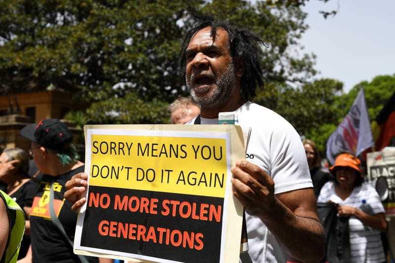 Demonstrators rally on the 11th anniversary of the National Apology to stolen generations in Sydney, Wednesday, February 13, 2019