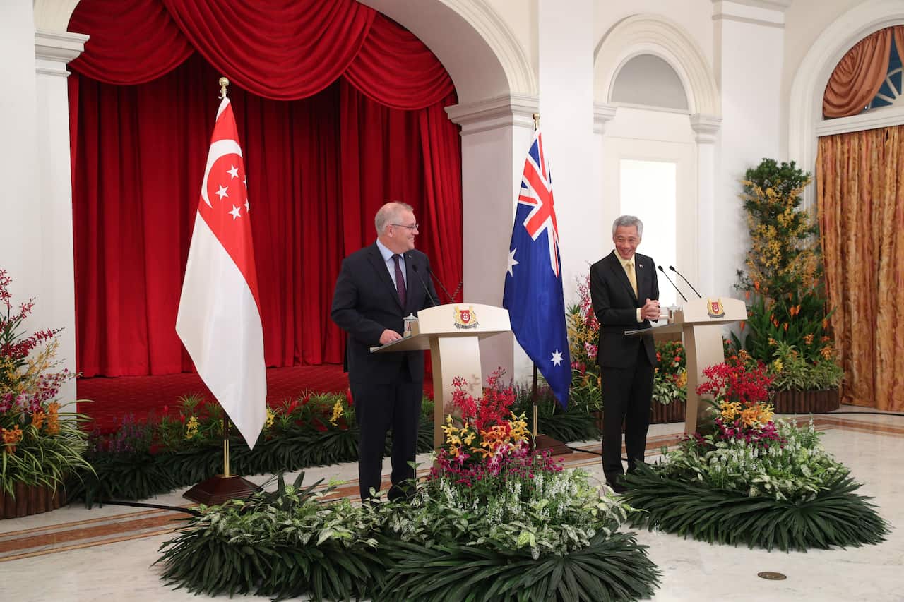 Prime Minister Scott Morrison has completed a trip to Singapore and is now on his way to Cornwall to meet with world leaders at the G7 summit.