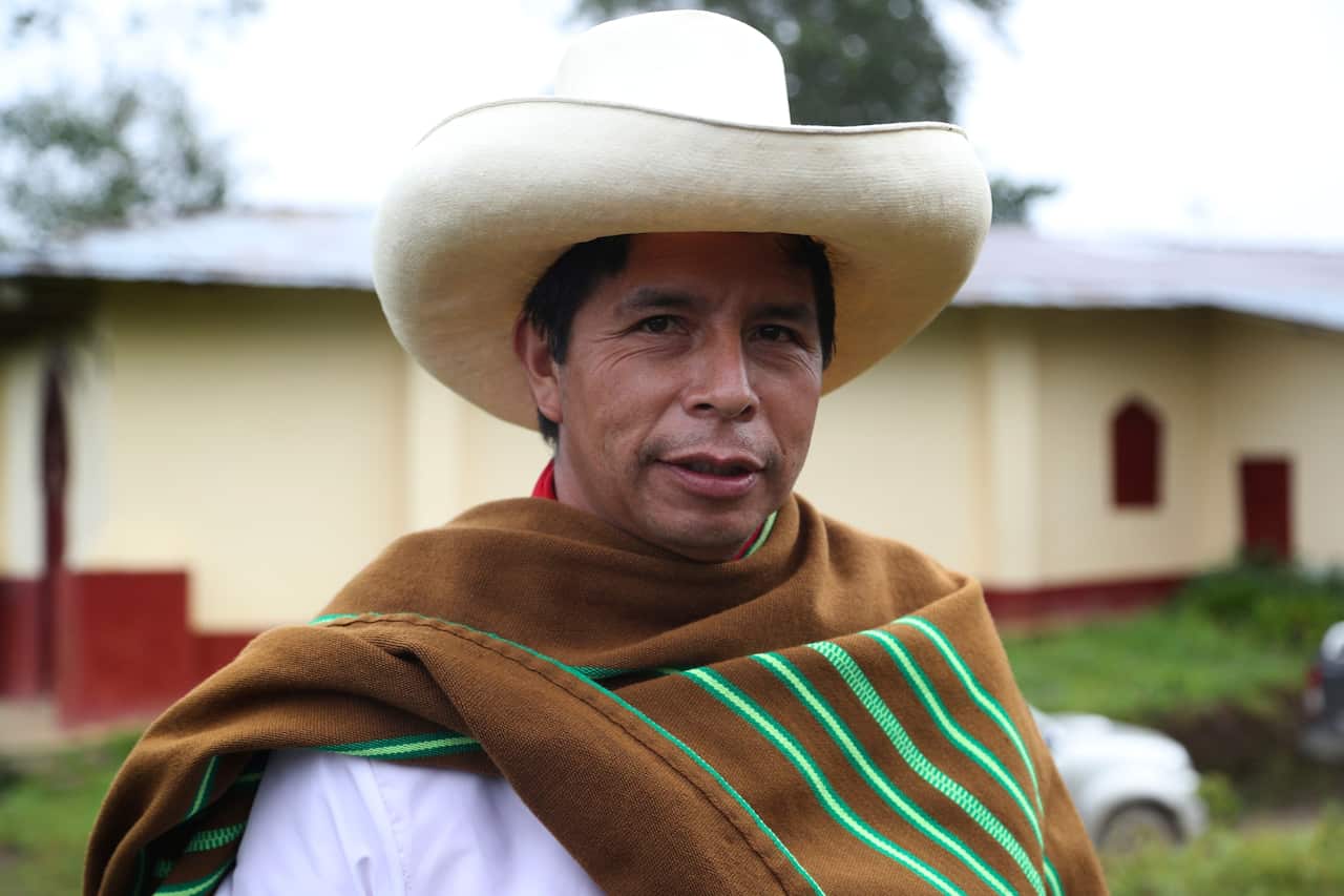 In this 16 April, 2021 file photo, Free Peru party presidential candidate Pedro Castillo poses for a photo on his property in Chugur, Peru. 
