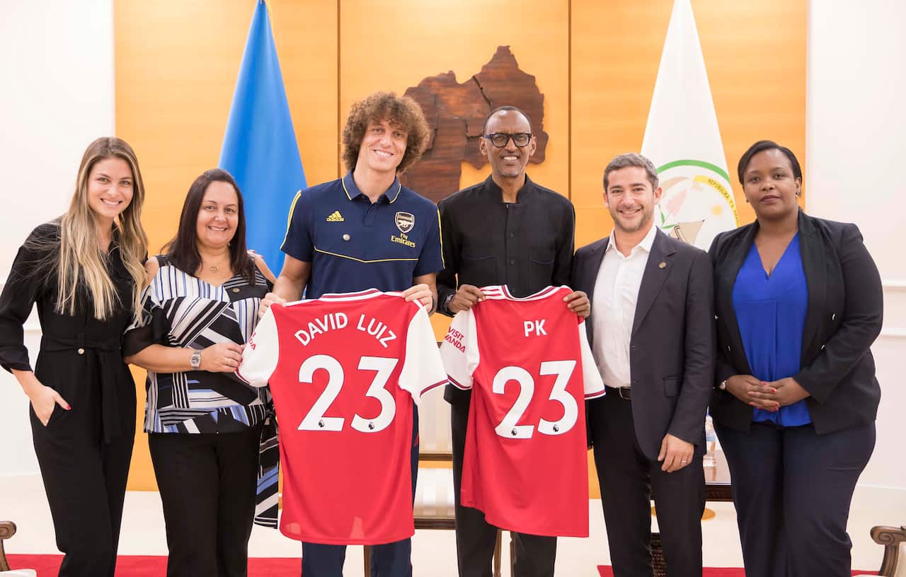  President Paul Kagame (third from right) with Arsenal player David Luiz in Kigali on 11 October 2019.