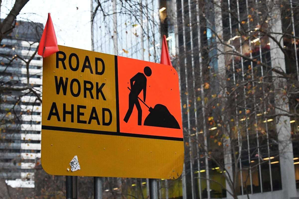 A road work sign is seen in Melbourne's CBD on Monday, July 8, 2018. (AAP Image/James Ross) NO ARCHIVING