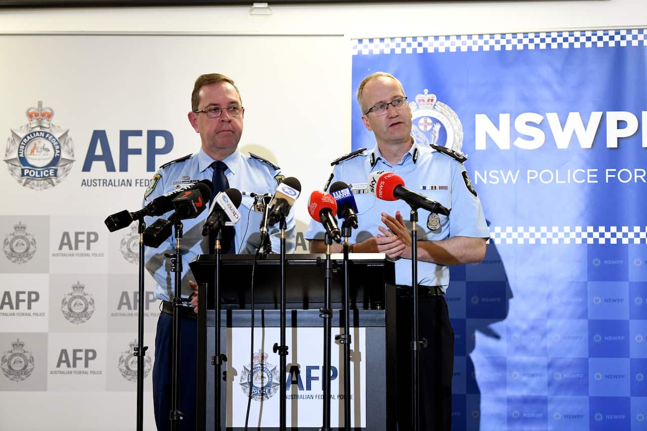 NSW Police Assistant Commissioner Mark Walton and Australian Federal Police (AFP) Assistant Commissioner Ian McCartney speak to the media.