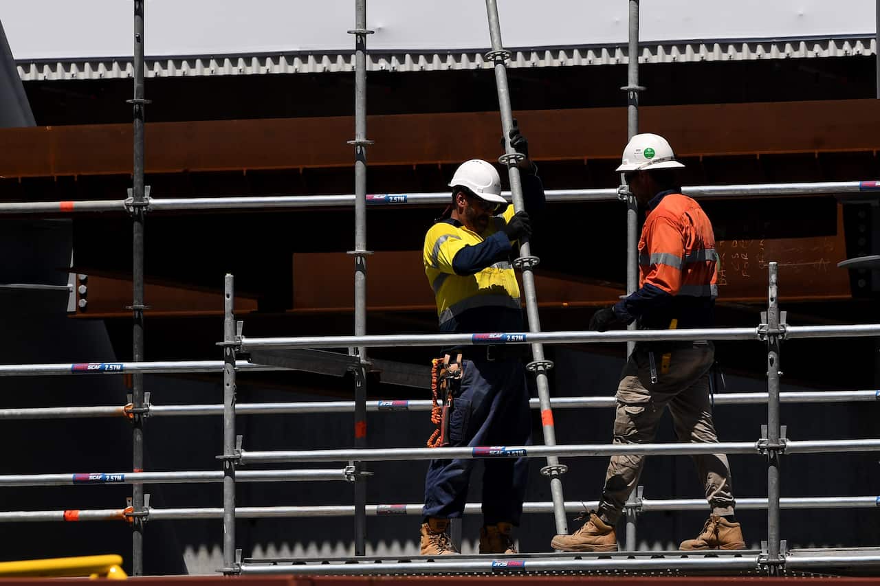 Workers seen at a construction site in Sydney in 2019
