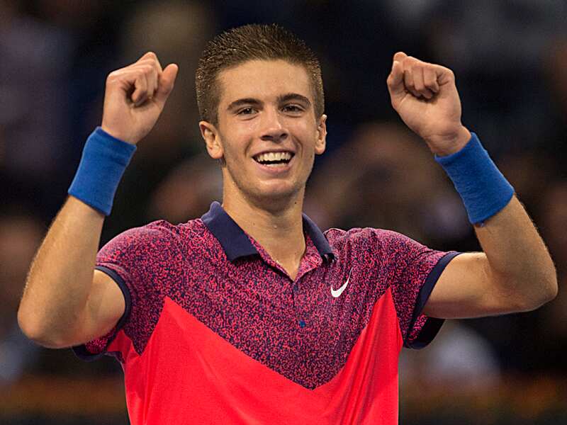 epa04462077 Croatia's Borna Coric cheers after winning his quarterfinal match against Spain's Rafael Nadal at the Swiss Indoors tennis tournament at the St. Jakobshalle in Basel, Switzerland, 24 October 2014.  EPA/GEORGIOS KEFALAS