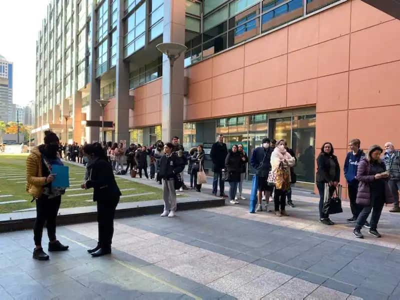 Long queues outside the passport office in Sydney.