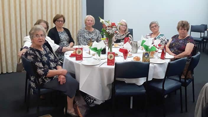 At Pronia's Christmas luncheon for its volunteers. 