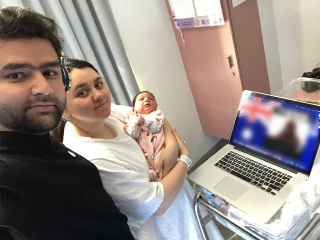 Fadi Albehnonissan attending his citizenship ceremony with his wife and newborn daughter