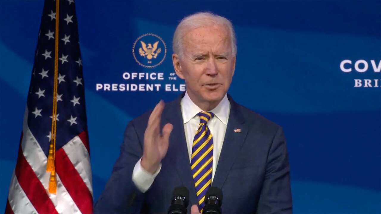 US President-elect Joe Biden speaks about the COVID-19 crisis from the Queen Theatre in Wilmington, Delaware on Tuesday, 29 December.
