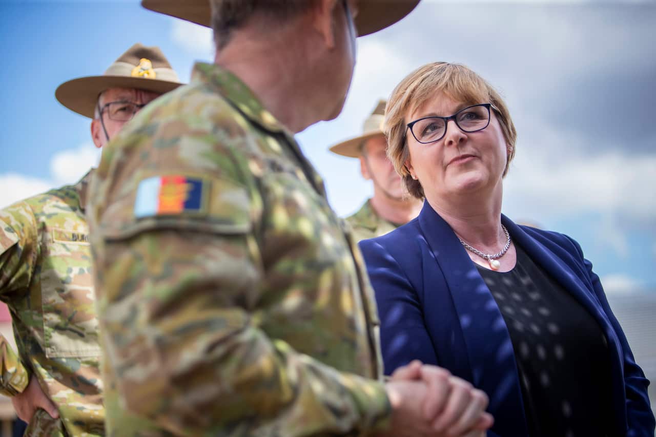 Minister for Defence Senator Linda Reynolds (right) speaks with Australian Army troops.