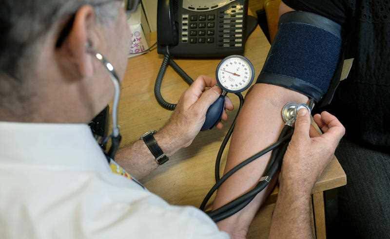 GP at work as GPs could help up to half of their patients with their problems over the phone, a new study has found.. Issue date: Thursday September 28, 2017.