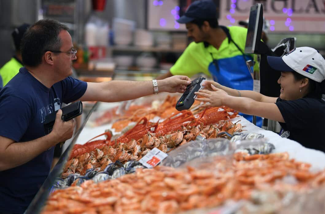 Crowds buying their Christmas Day seafood during the annual 36-hour seafood marathon at Sydney Fish Market in Pyrmont, Sydney, Monday, December 23, 2019