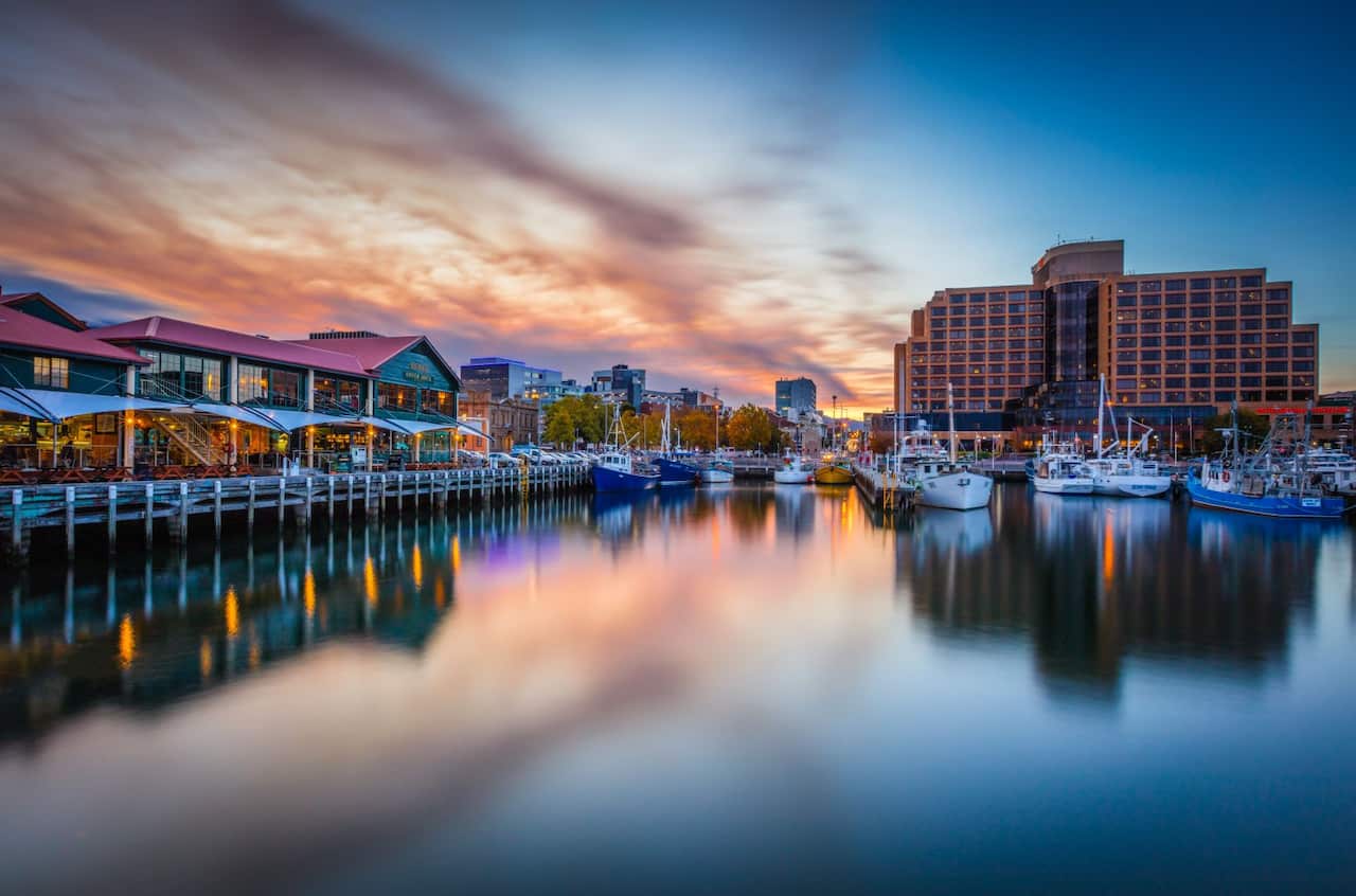 An international student who worked at Tasmania's Grand Chancellor hotel, Hobart, was diagnosed with covid-19