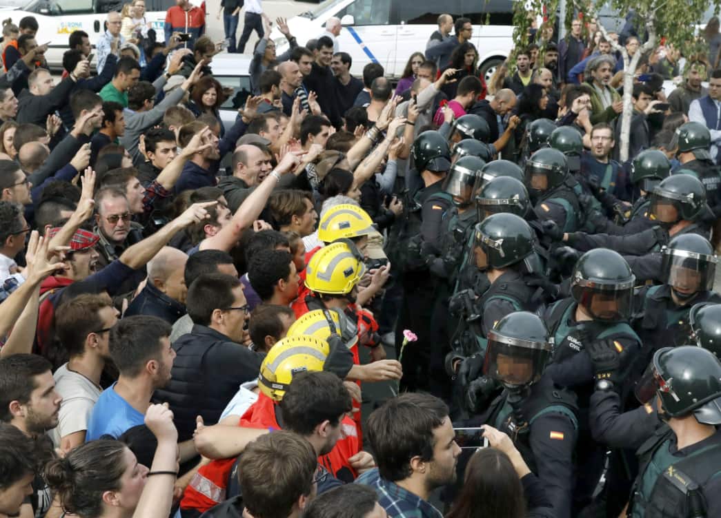 National Police block people from entering a polling center at Sant Julia Sports Center in Barcelona, Catalonia, on 1 October, 2017.