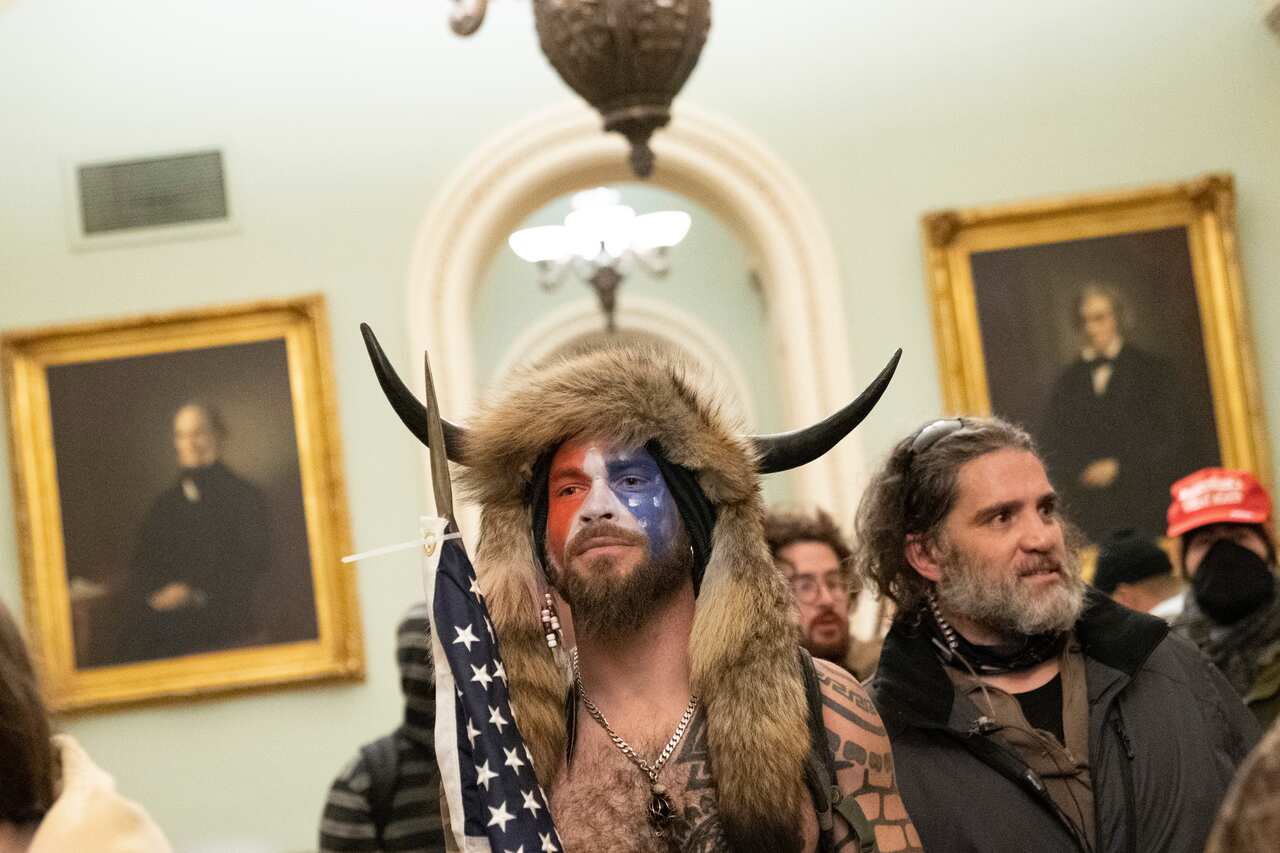 6 January 2021- Washington DC- Jake Angeli the QAnon Shaman joins protesters as they storm the Capitol during a Joint Session of Congress in which members were to certify the 2020 Presidential election. Photo Credit: Chris Kleponis/Sipa USA