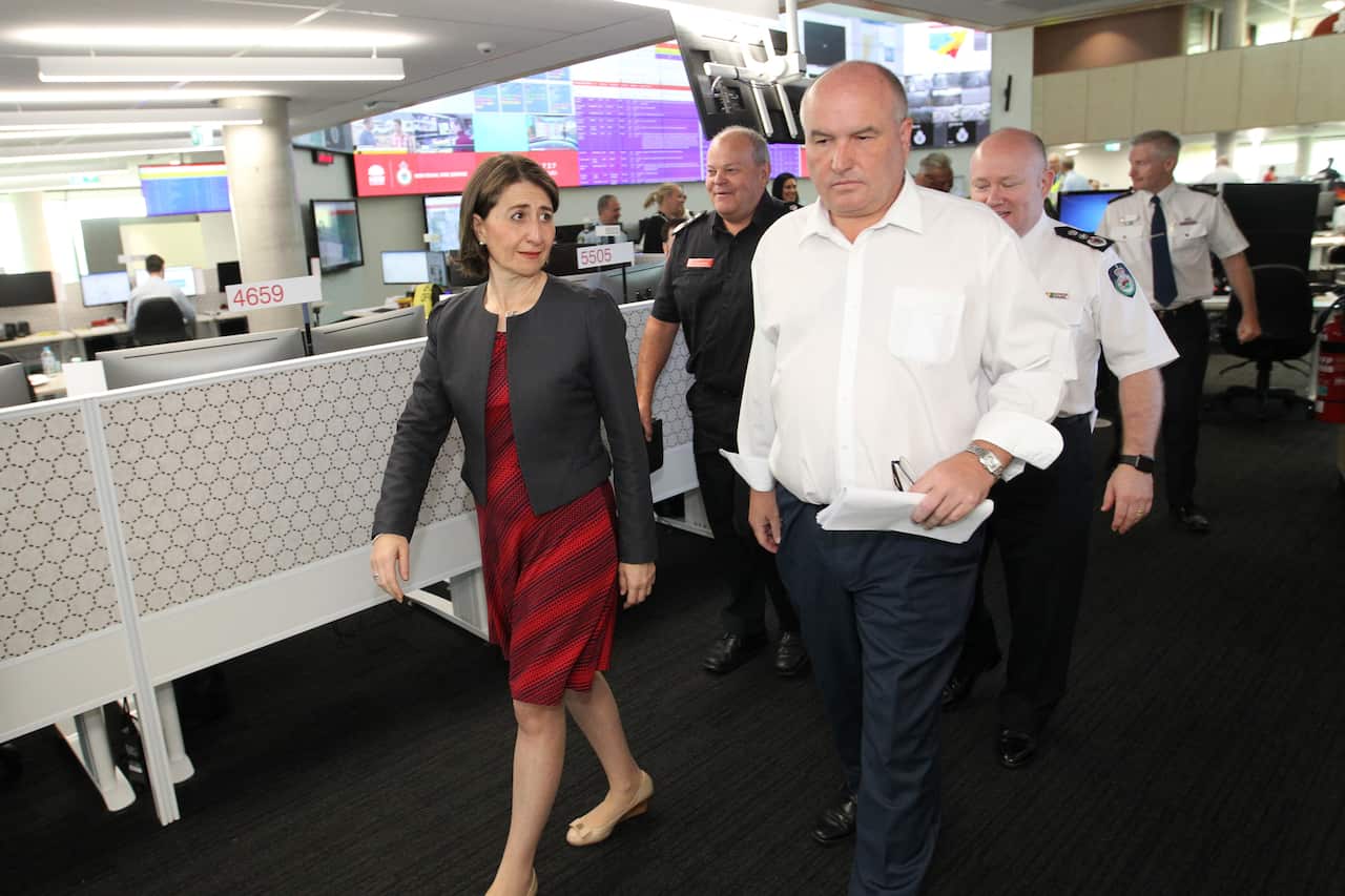 NSW Premier Gladys Berejiklian and Emergency Services Minister David Elliott are seen at NSW Rural Fire Service headquarters in Sydney.