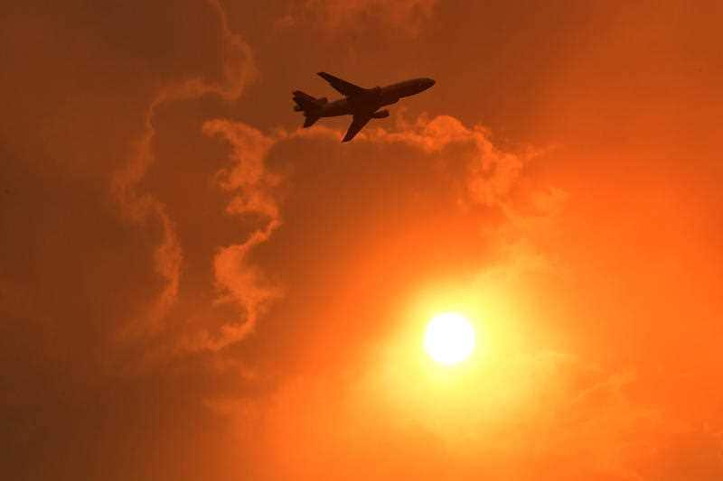 A DC-10 Air Tanker makes a pass to drop fire retardant on a bushfire in North Nowra, 160km south of Sydney, Saturday, January 4, 2020