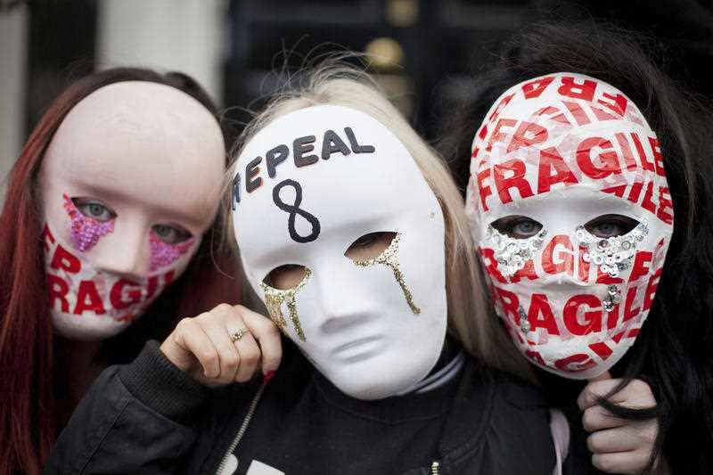 Demonstrators pose during The March for Choice event in Dublin, Ireland, calling for a change to Ireland's strict abortion laws Saturday September 30, 2017.